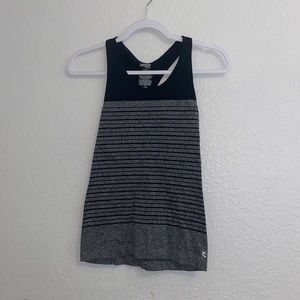 Grey and Black Striped Danskin Now Razorback Tank Top. Size XS.